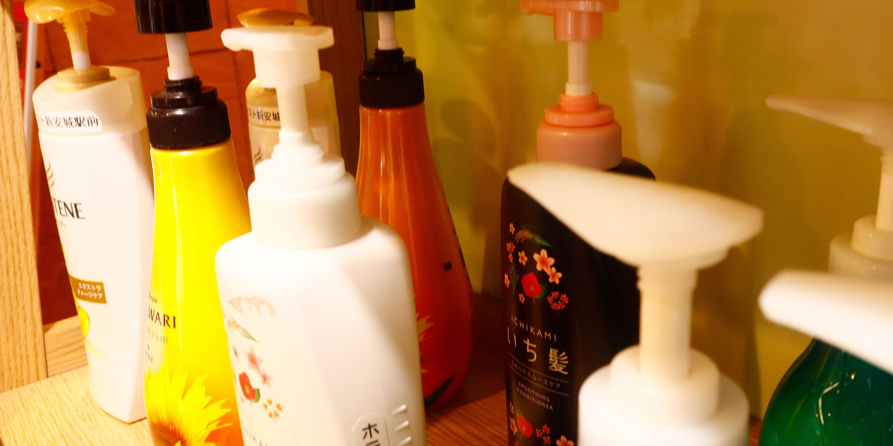 A variety of personal care products on a shelf.
