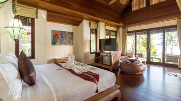 Beach Front Villa | Living area | Flat-screen TV