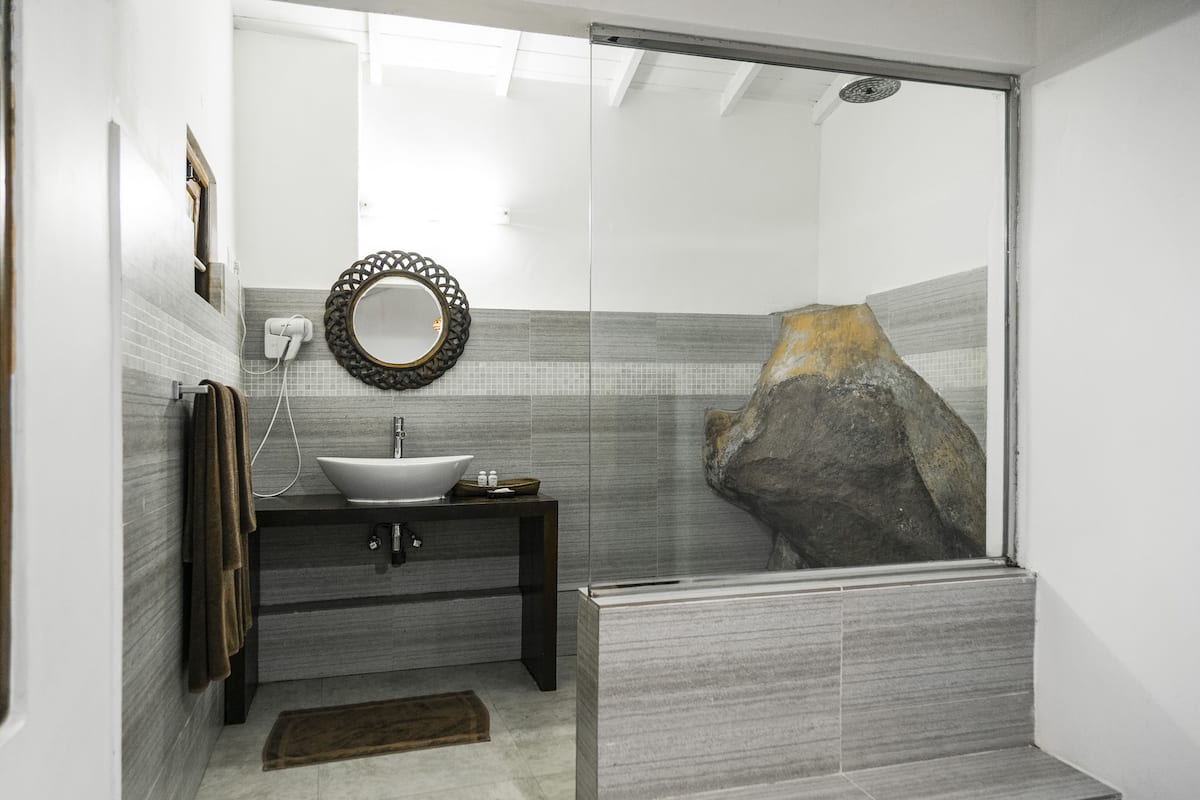 superior room | bathroom | shower, rainfall showerhead, free toiletries, towels