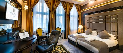 Standard Twin Room | Minibar, in-room safe, desk, soundproofing