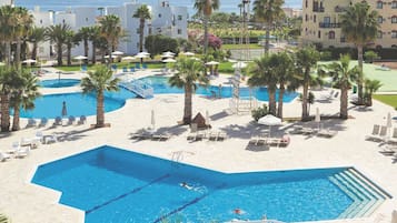 2 outdoor pools, pool umbrellas, pool loungers