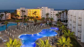 2 outdoor pools, pool umbrellas, pool loungers