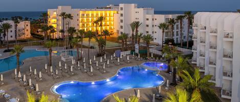 2 outdoor pools, pool umbrellas, sun loungers