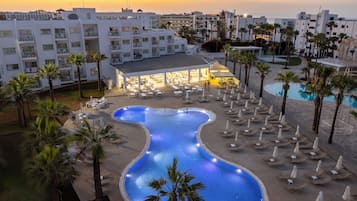 2 outdoor pools, pool umbrellas, pool loungers