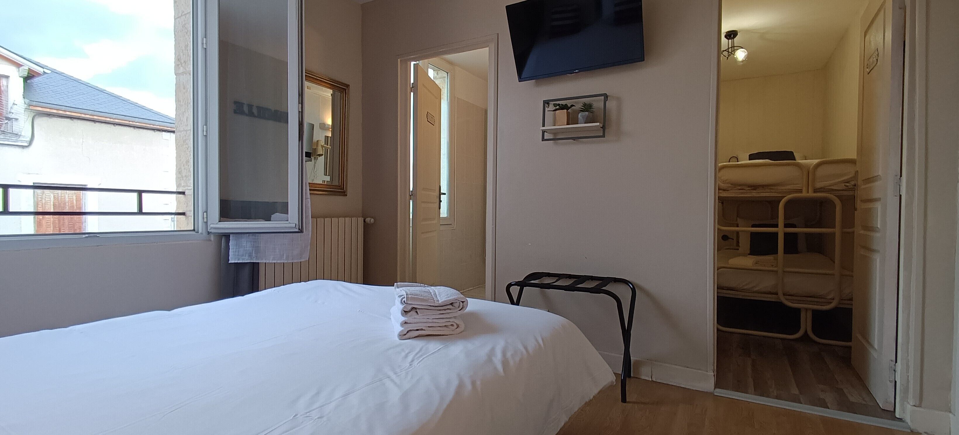 Family Room (street view) | Premium bedding, in-room safe, blackout curtains, iron/ironing board