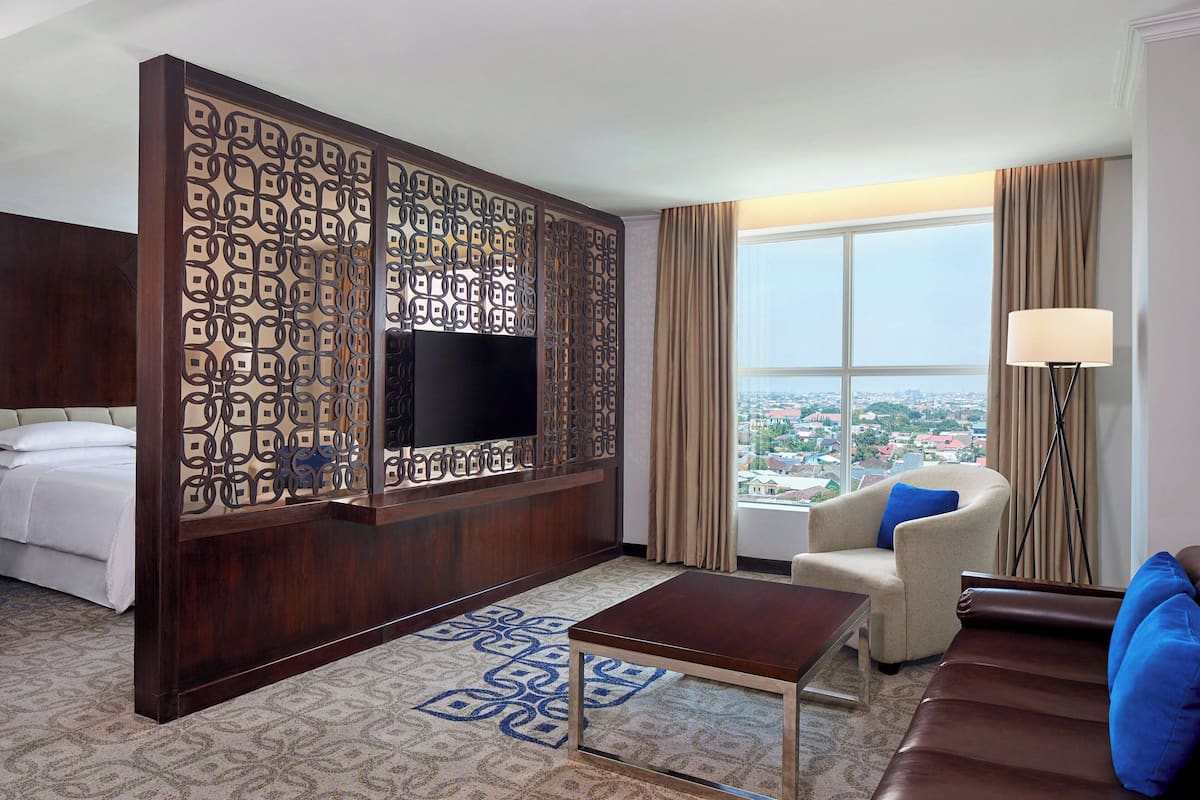 Executive Suite, 1 Bedroom, Non Smoking, City View | Living room | 48-inch LED TV with satellite channels, TV