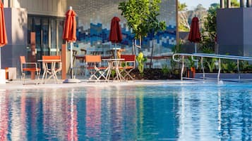 Breakfast, lunch, dinner served; local cuisine, pool views