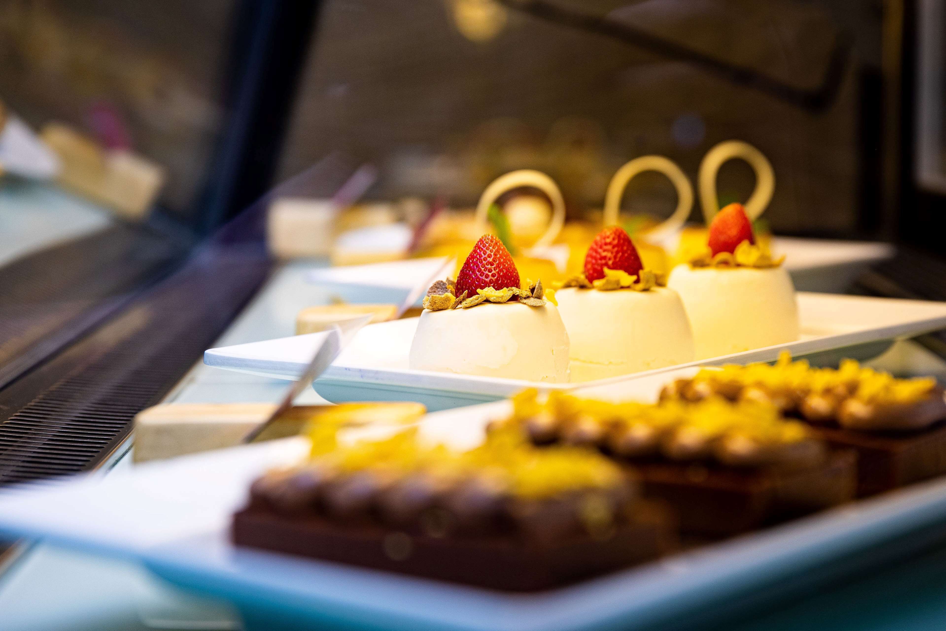 A dessert display with various sweet treats.