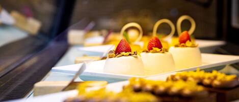 A dessert display with various sweet treats.