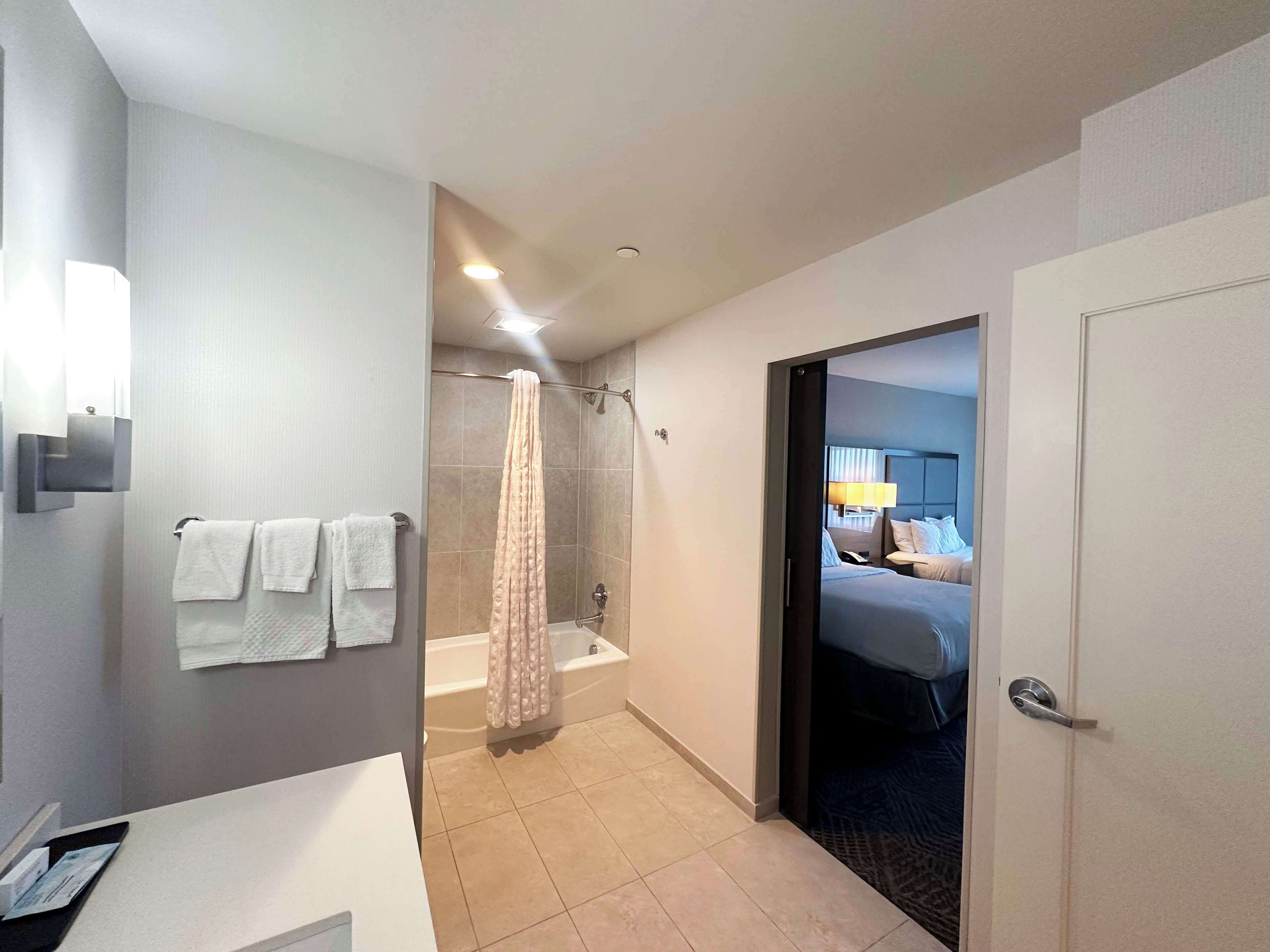 suite, 2 queen beds, non smoking | bathroom | free toiletries, hair dryer, towels, soap