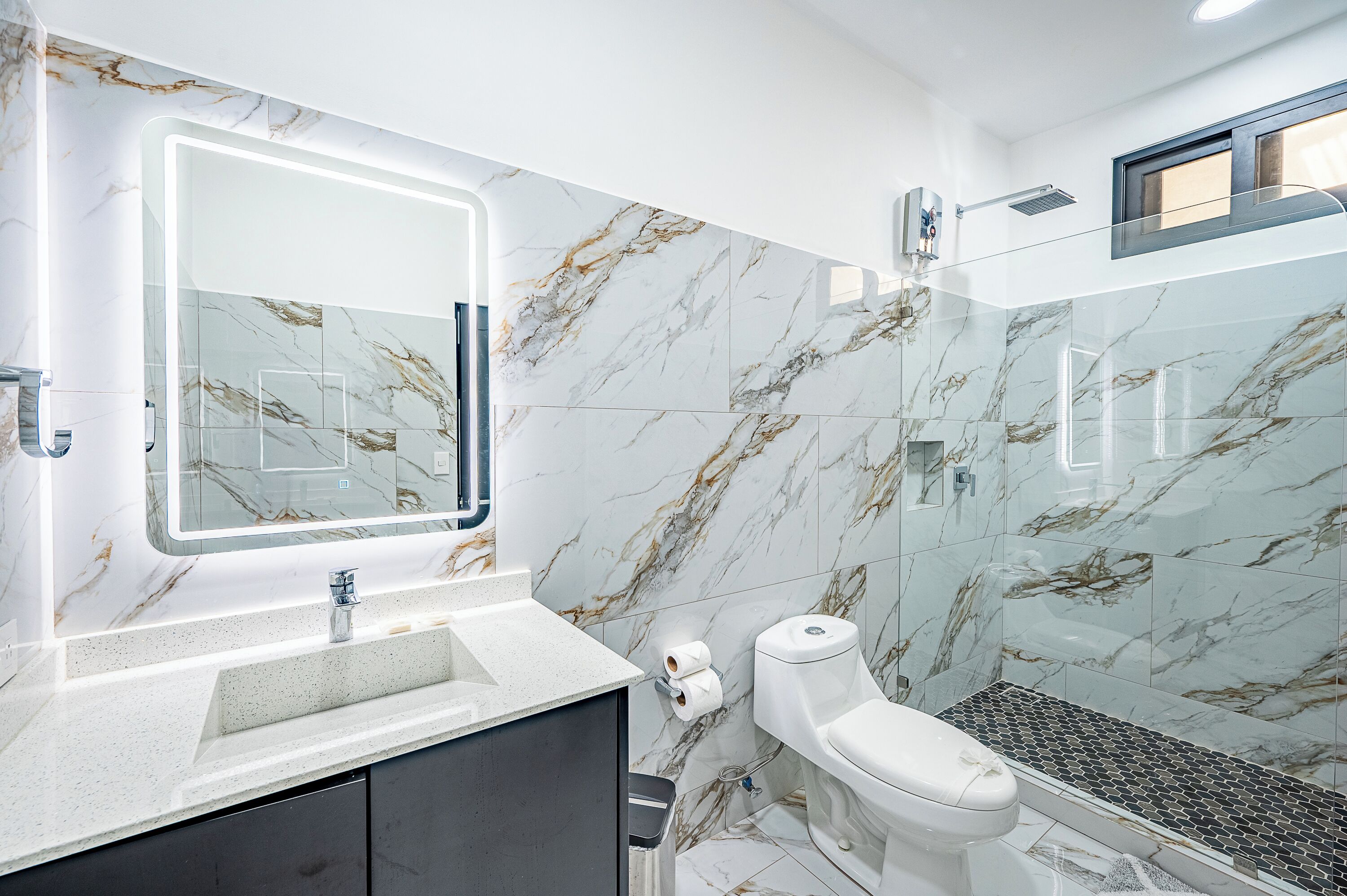 standard room, multiple beds | bathroom | shower, towels, soap, shampoo