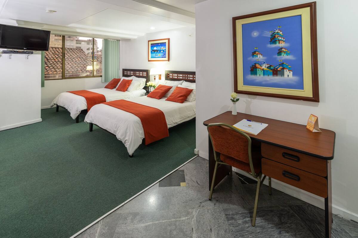 Deluxe Triple Room | Down duvets, in-room safe, individually furnished, desk