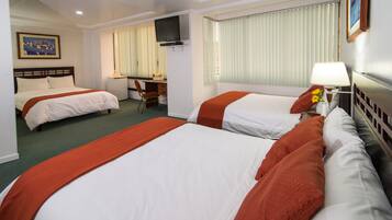 Chambre Triple Deluxe | Couette en duvet d'oie, coffres-forts dans les chambres