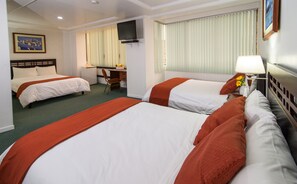 Deluxe Triple Room | Down duvets, in-room safe, individually furnished, desk