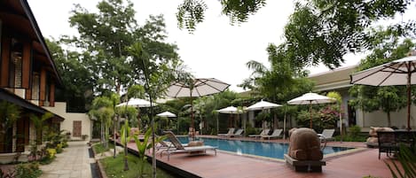 Outdoor pool, pool umbrellas, pool loungers