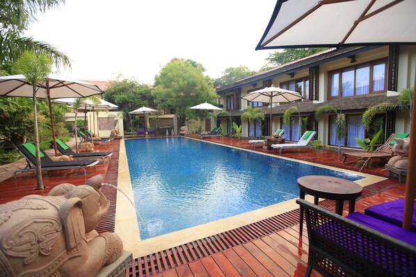 Outdoor pool, pool umbrellas, pool loungers