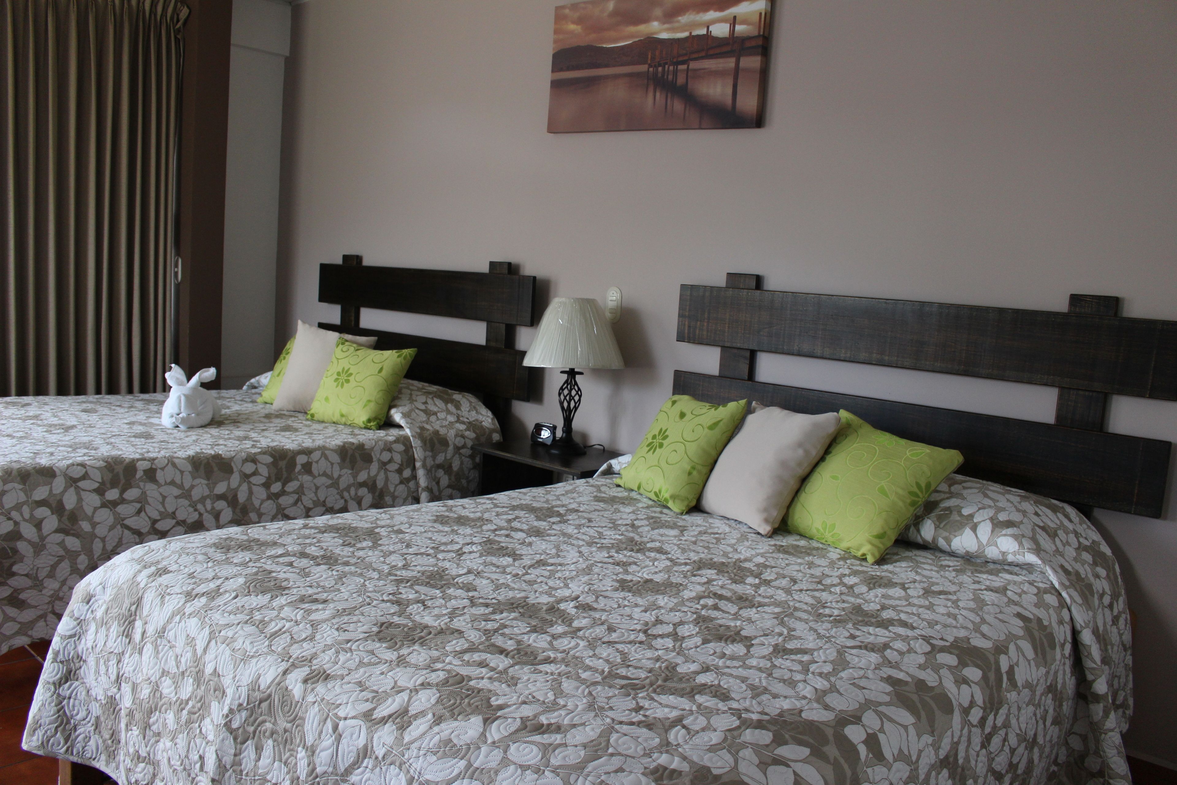 standard double room, 2 queen beds, city view | 1 bedroom, down duvets, minibar, in-room safe