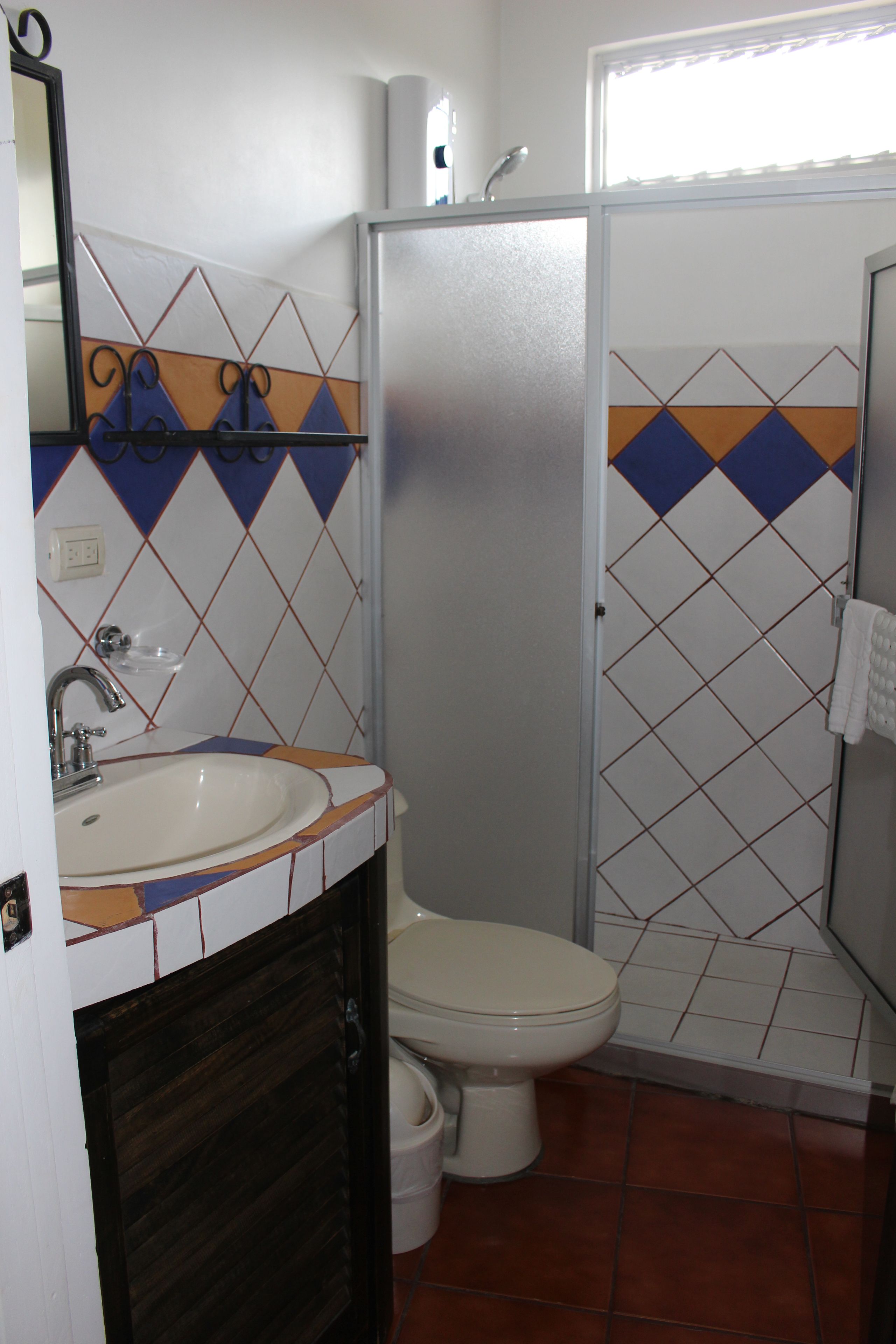 standard double room, 2 queen beds, city view | bathroom | shower, free toiletries, hair dryer, towels