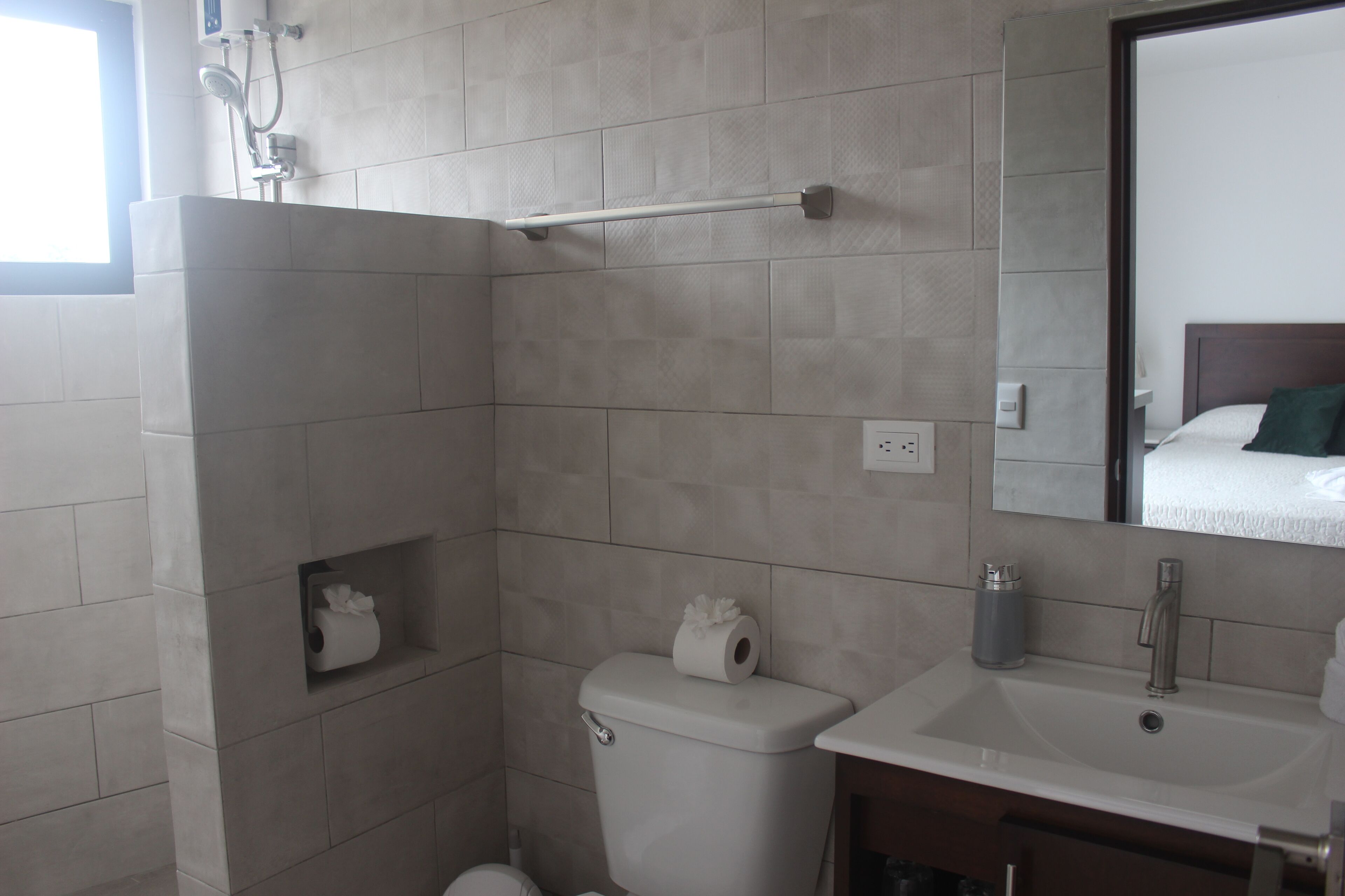 shower, free toiletries, hair dryer, towels