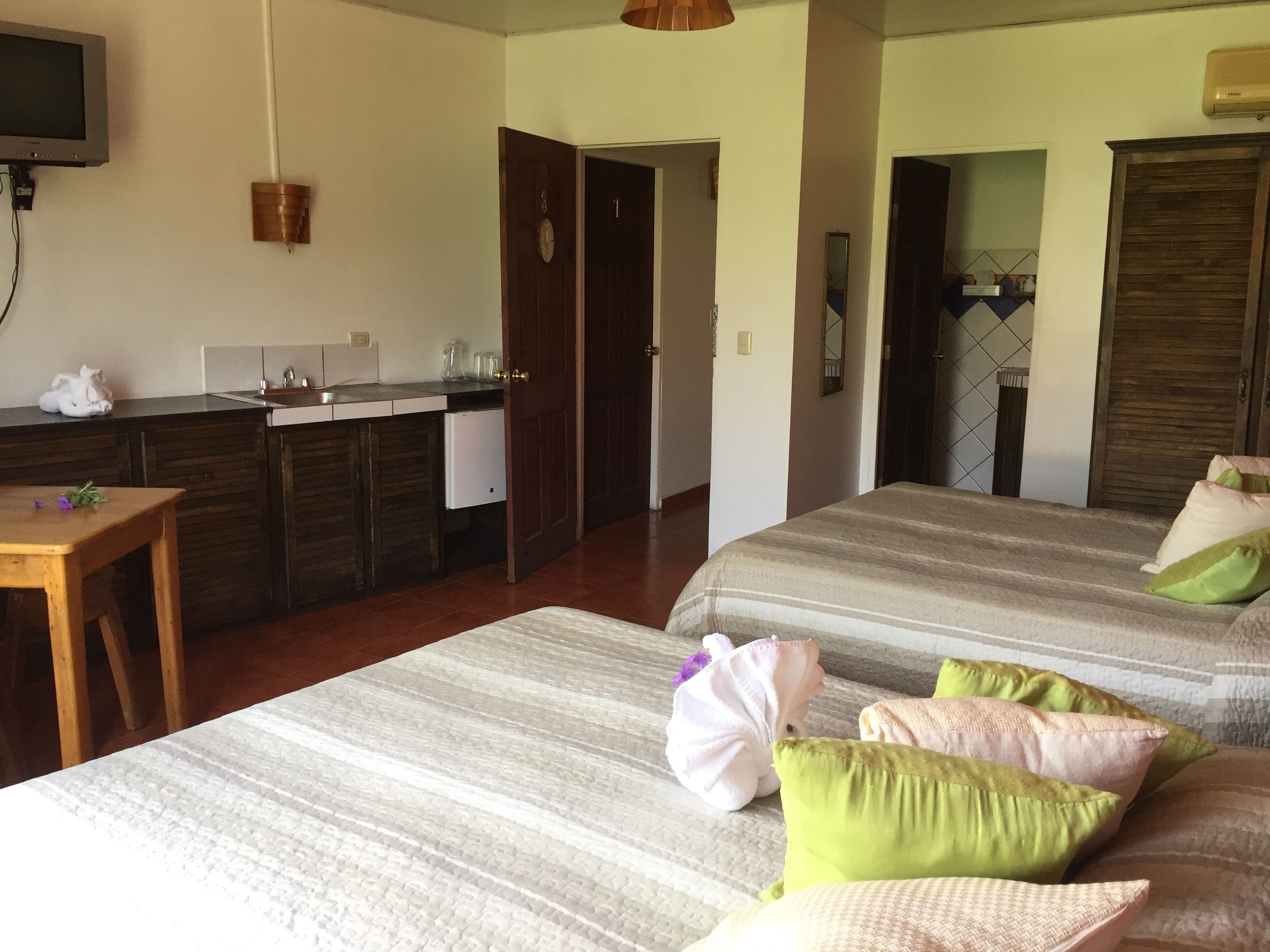 standard double room, 2 queen beds, city view | 1 bedroom, down duvets, minibar, in-room safe