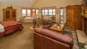 En 55-tommers TV med Parabol-TV samt peis