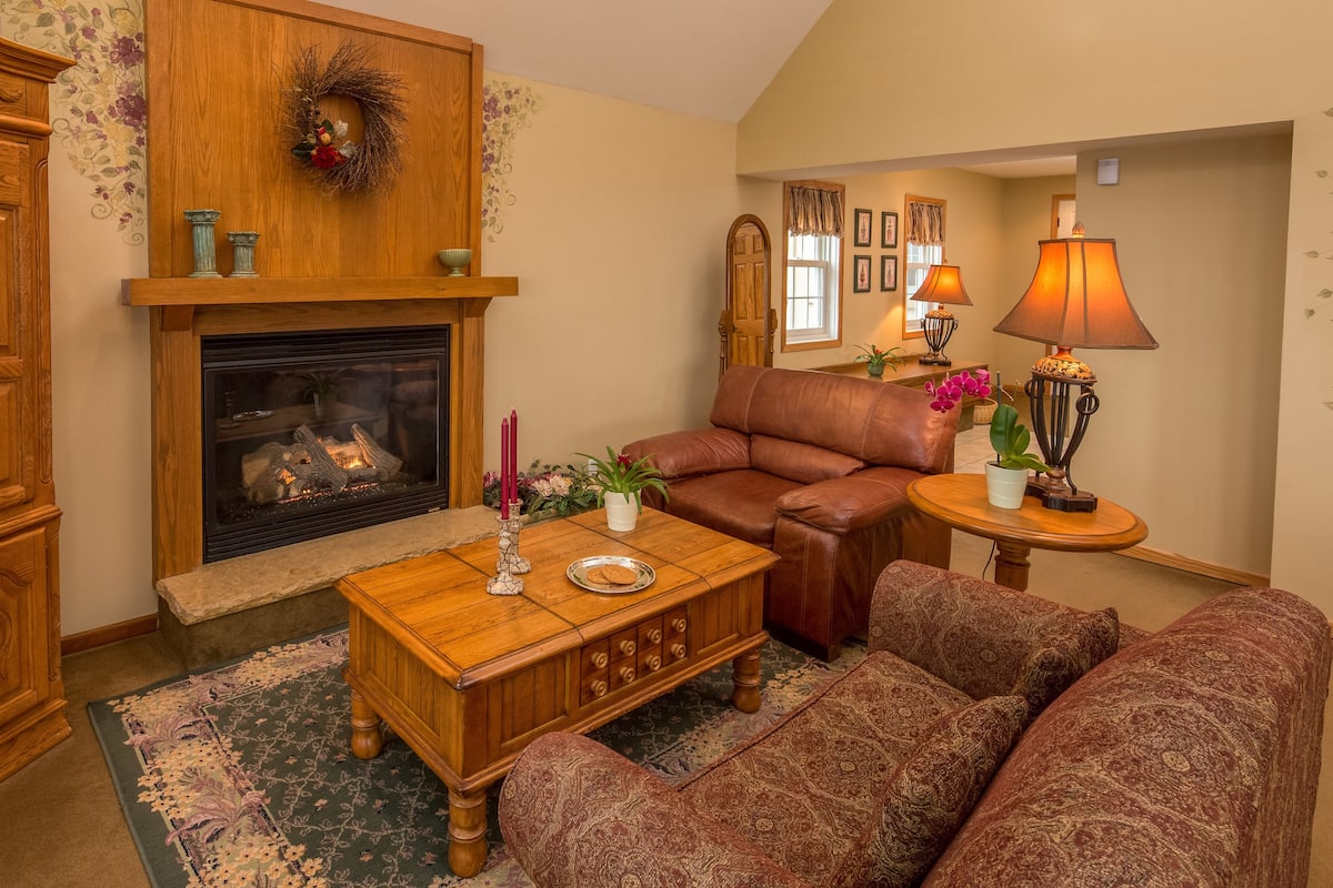 55-inch TV with satellite channels, fireplace