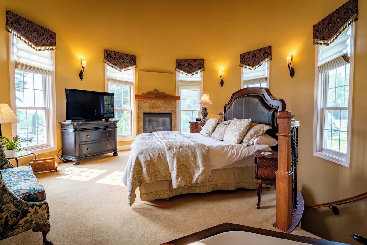 55-inch TV with satellite channels, fireplace