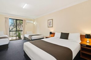 Family Room | Premium bedding, desk, iron/ironing board, free WiFi - Econo Lodge Waterford (Waterford West)