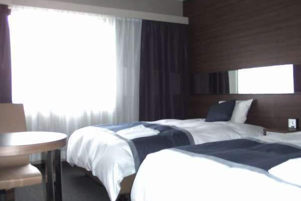 1 bedroom, desk, blackout drapes, iron/ironing board