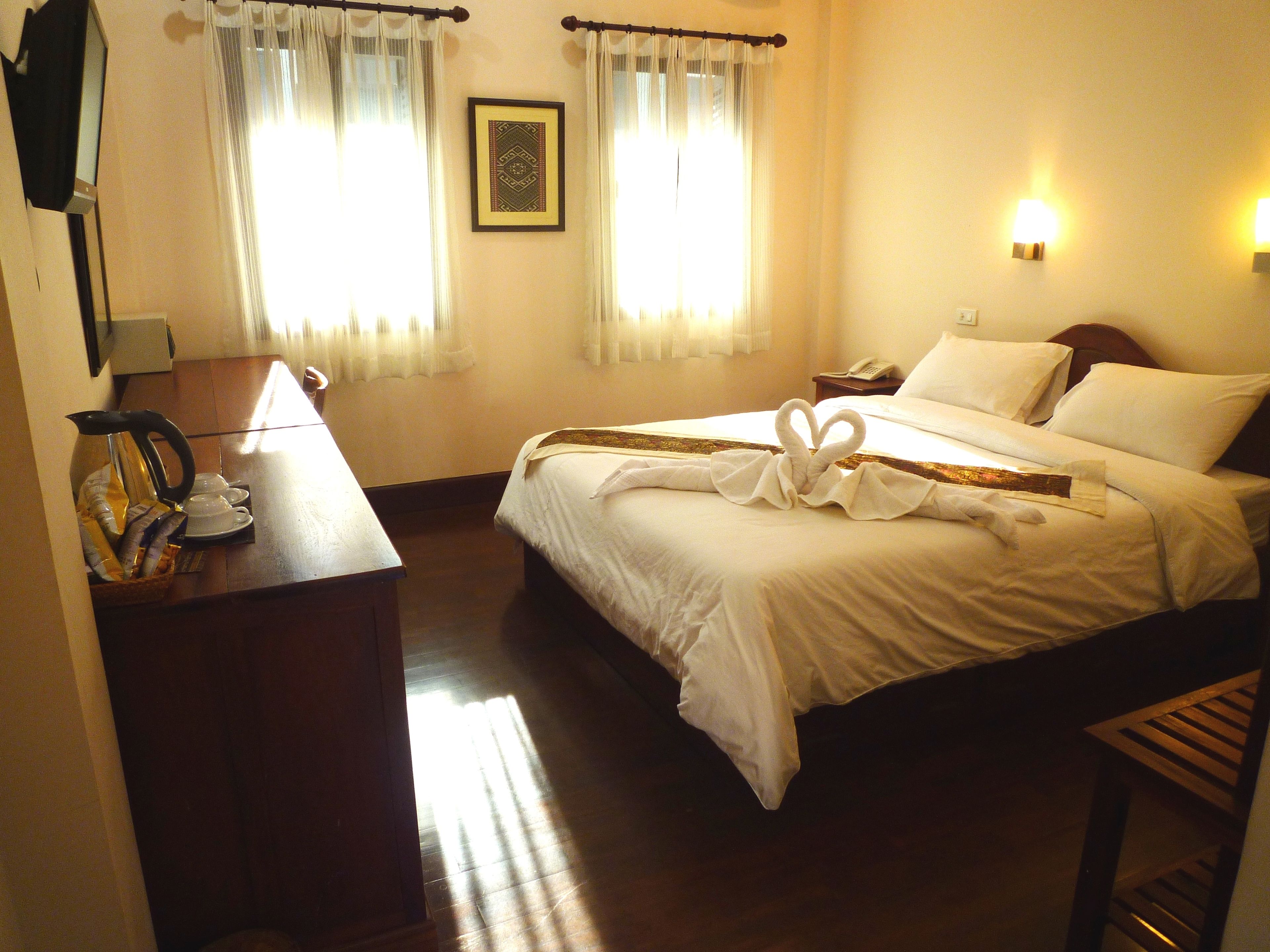 standard double room, patio | premium bedding, minibar, in-room safe, desk