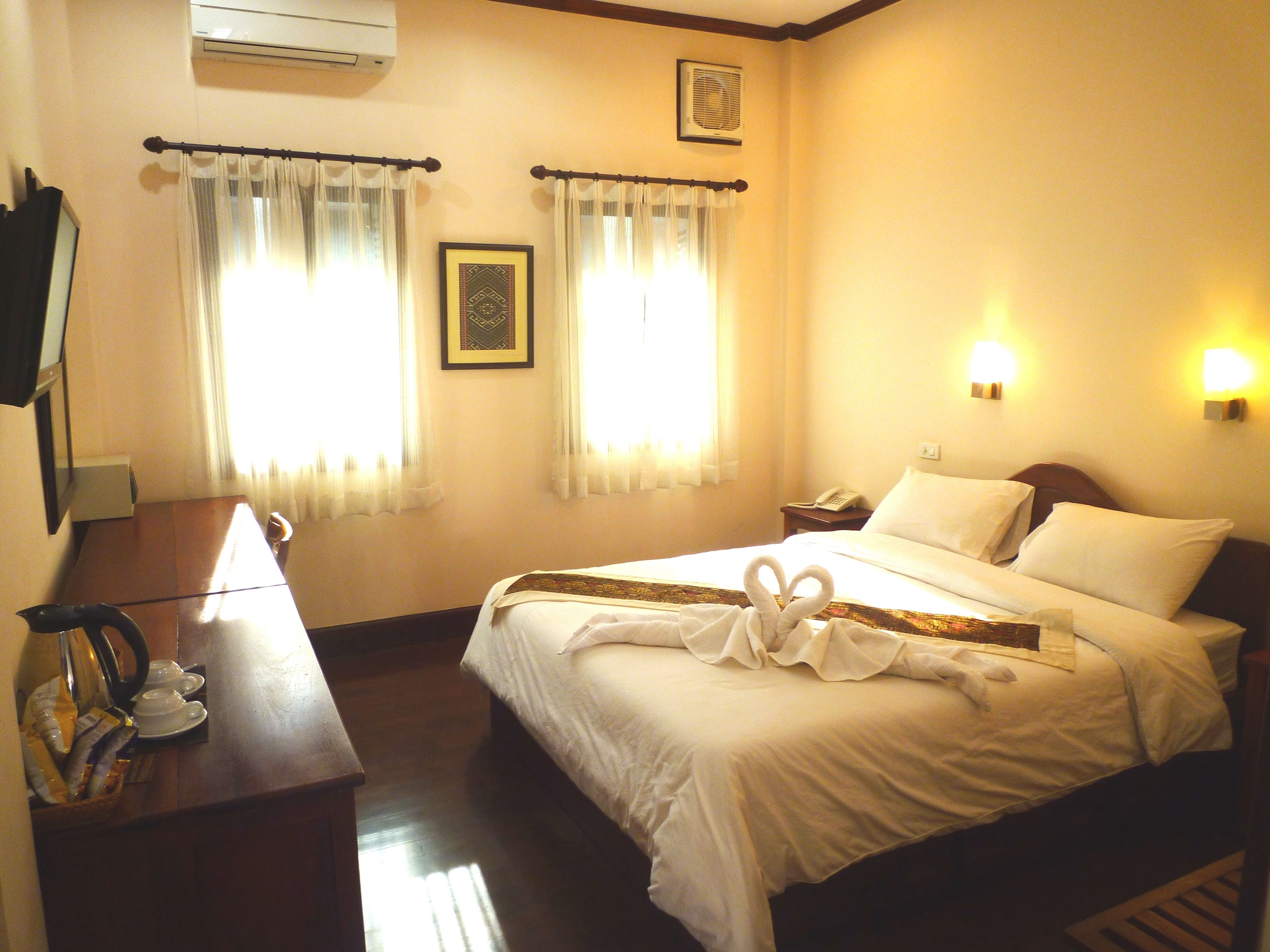 standard double room, patio | premium bedding, minibar, in-room safe, desk