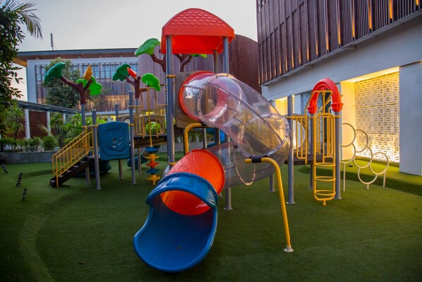 A playground with slides and climbing structures. - Bali Paragon Resort Hotel (Jimbaran)