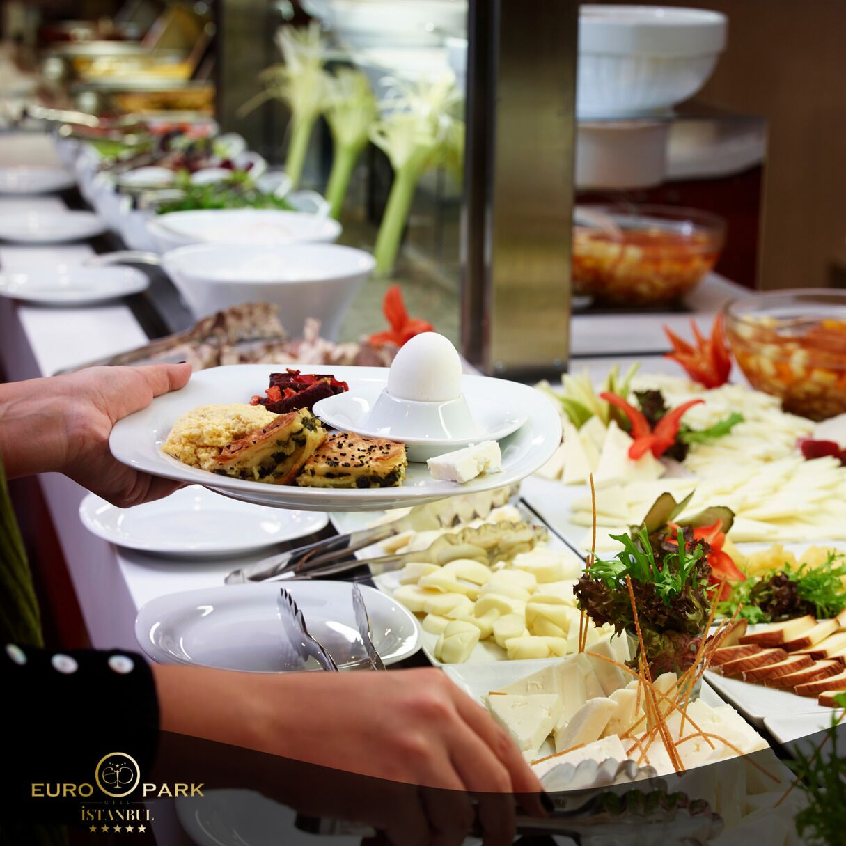 A buffet with various food items including a white egg, salads, and bread.