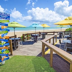 On the beach, beach cabanas, sun loungers, beach umbrellas