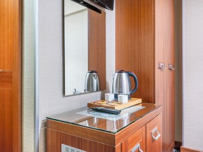 Premium bedding, down comforters, in-room safe, soundproofing