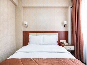 Standaard kamer | Luxe beddengoed, donzen dekbedden, een kluis op de kamer