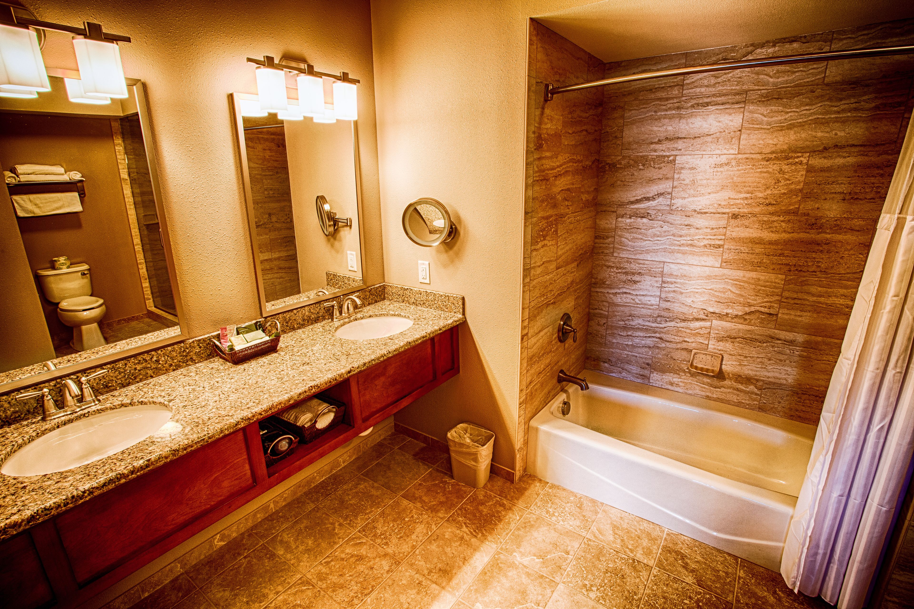 suite, balcony, partial ocean view | bathroom | hair dryer, towels, soap, shampoo