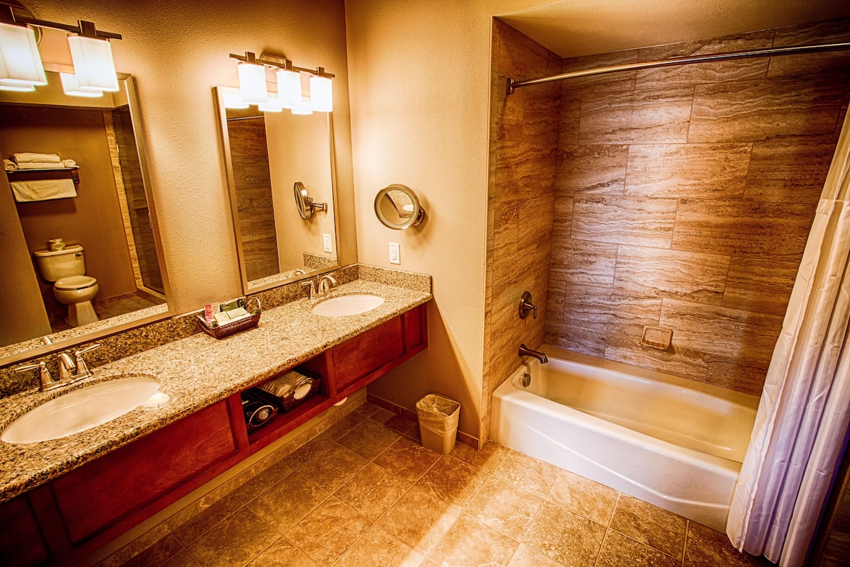 suite, balcony, partial ocean view | bathroom | hair dryer, towels, soap, shampoo