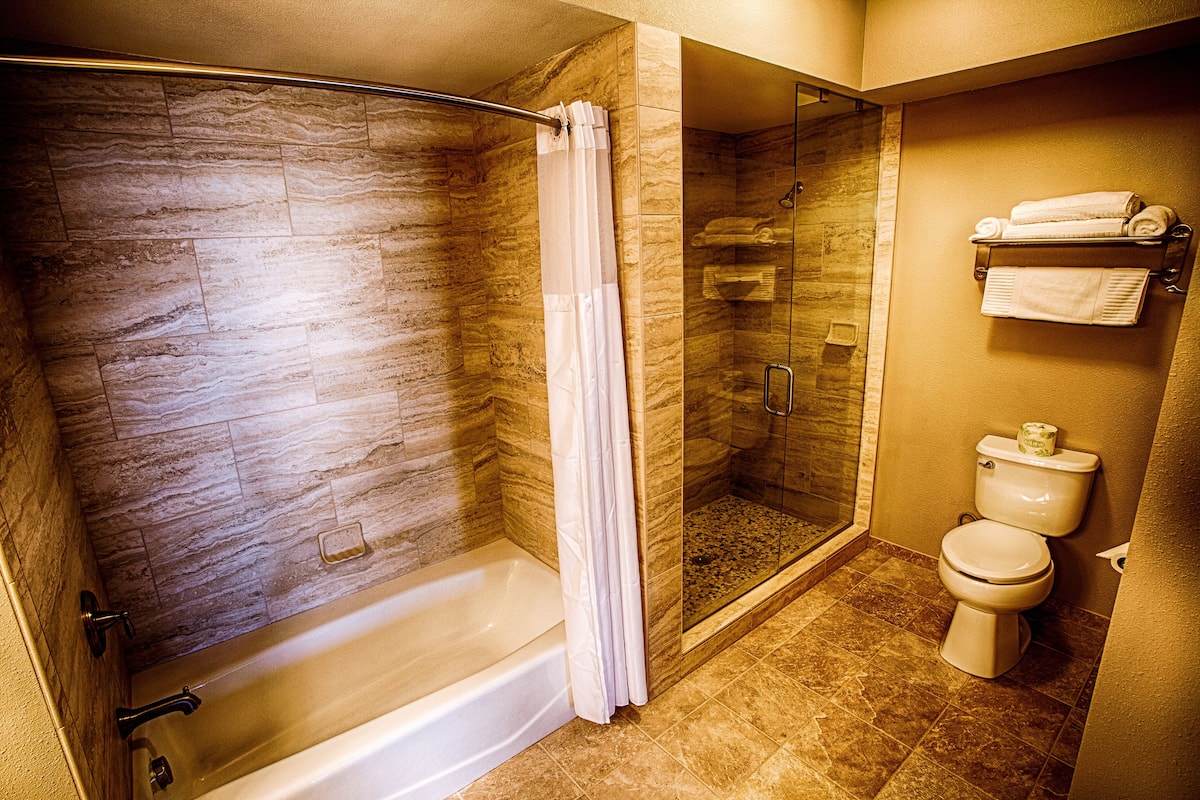 suite, balcony, partial ocean view | bathroom | hair dryer, towels, soap, shampoo