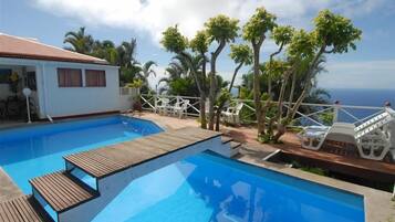 Outdoor pool, sun loungers