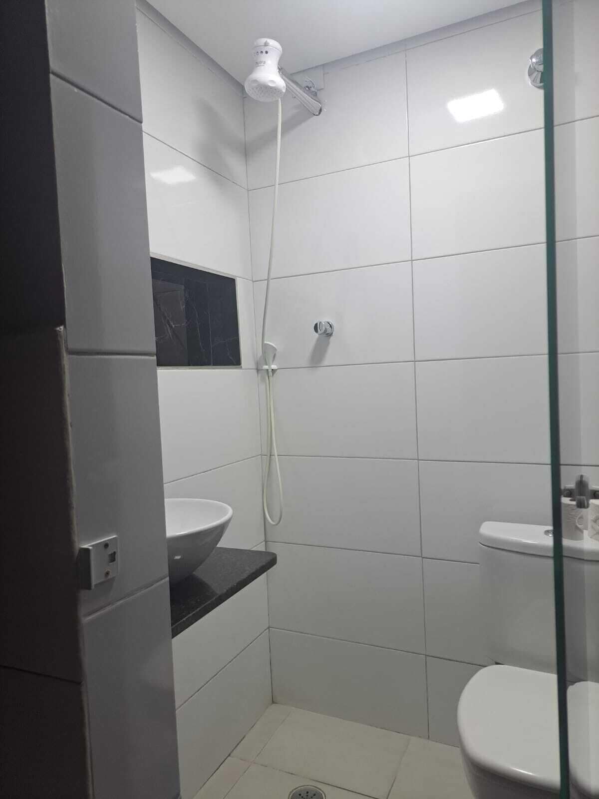 shower, free toiletries, slippers, towels