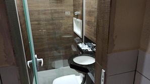 Shower, free toiletries, slippers, towels