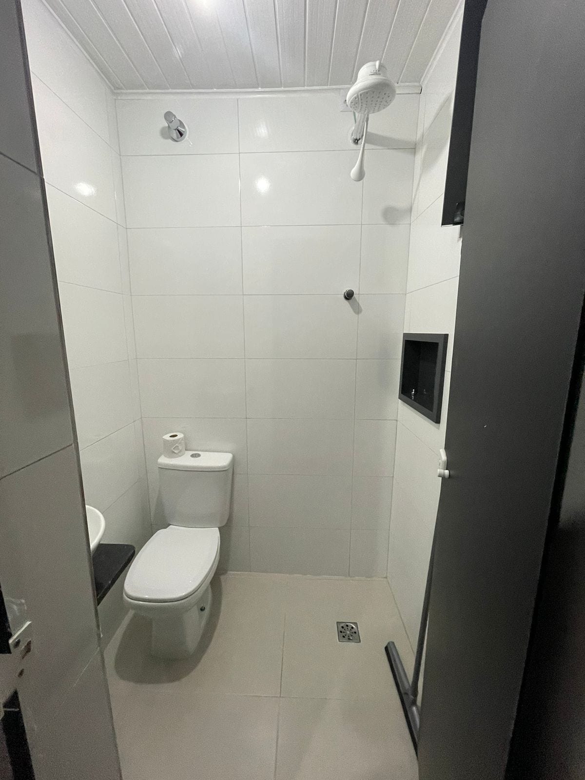 shower, free toiletries, slippers, towels