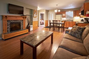 Condo, 2 Bedrooms | Living area | 42-inch flat-screen TV with cable channels, TV, fireplace