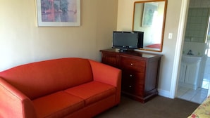 Standard Room, 2 Queen Beds | Living area | TV