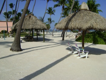 On the beach, beach towels at Breezy Palms Resort