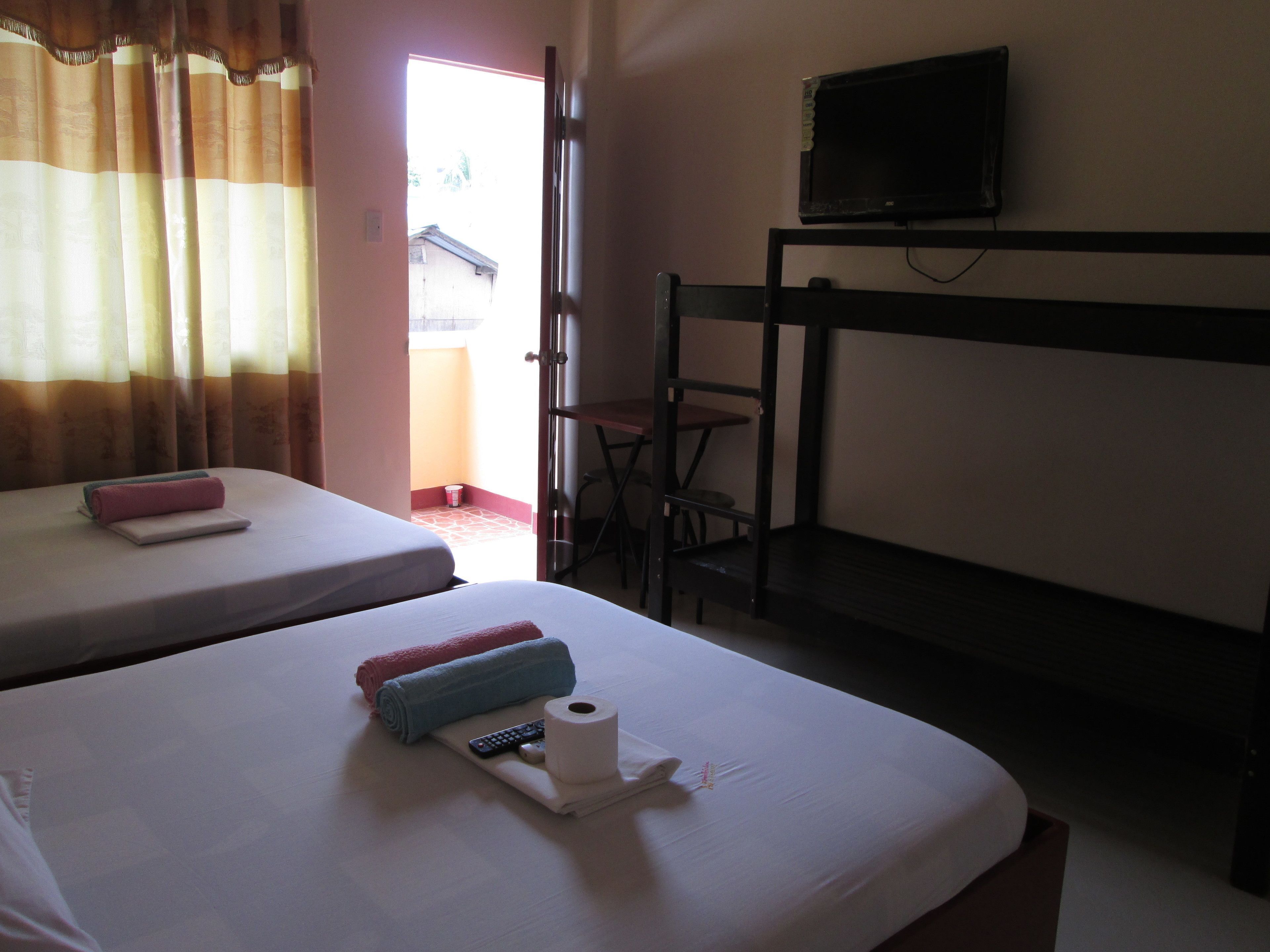 Desk, blackout drapes, rollaway beds, free WiFi