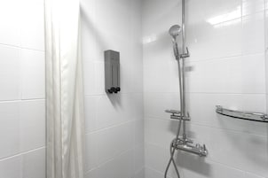 Shower, free toiletries, hair dryer, slippers