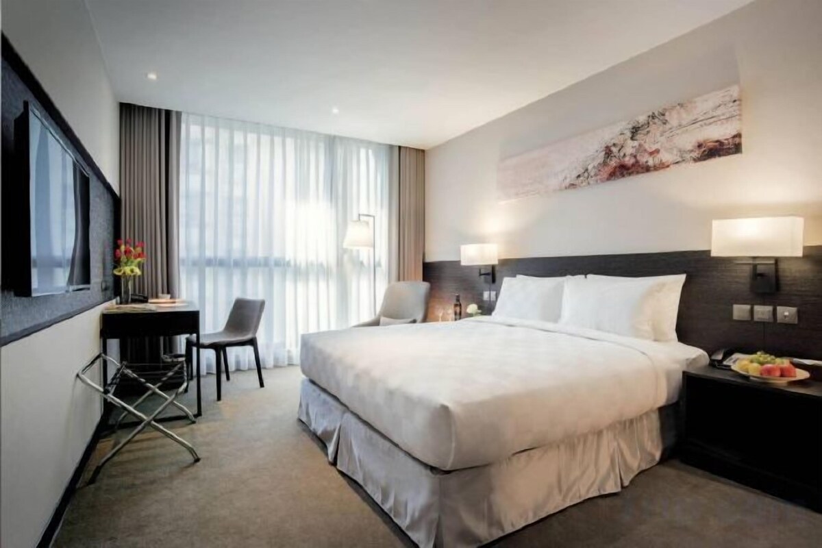 Ropa de cama de alta calidad, minibar, caja fuerte y escritorio
