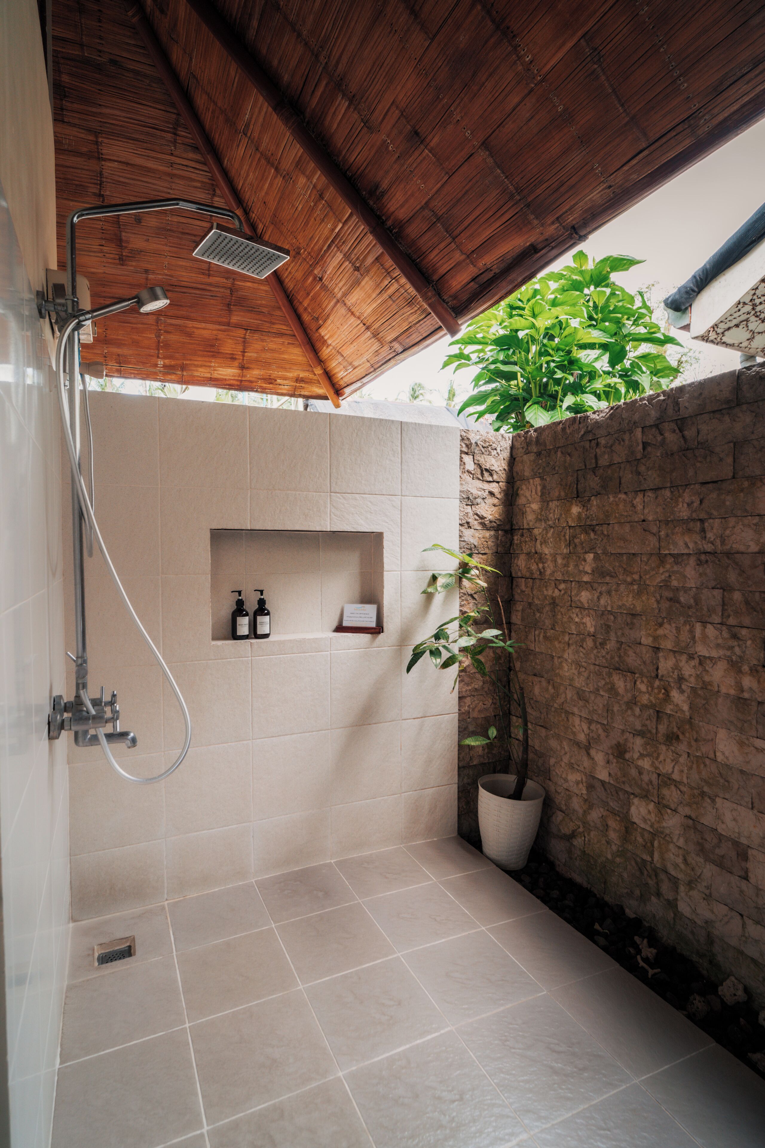 room (pool view king) | bathroom | shower, rainfall showerhead, free toiletries, towels